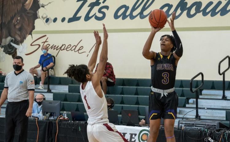 Columbia guard Charleston Ponds lets a shot fly against West Nassau in the fifth-place game at the Battle at The Villages on Wednesday. (COURTESY)