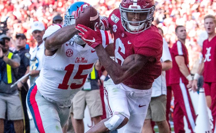 Alabama receiver DeVonta Smith catches a touchdown against Ole Miss on Sept. 28, 2019. (MICKEY WELSH/TNS)