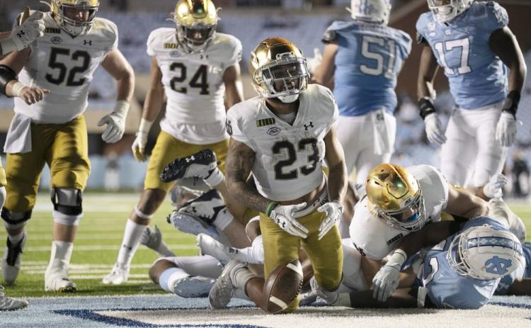 Notre Dame's Kyren Williams (23) reacts after scoring on a 1-yard carry against North Carolina on Nov. 27 in Chapel Hill, N.C. (ROBERT WILLET/The News & Observer via AP, Pool)