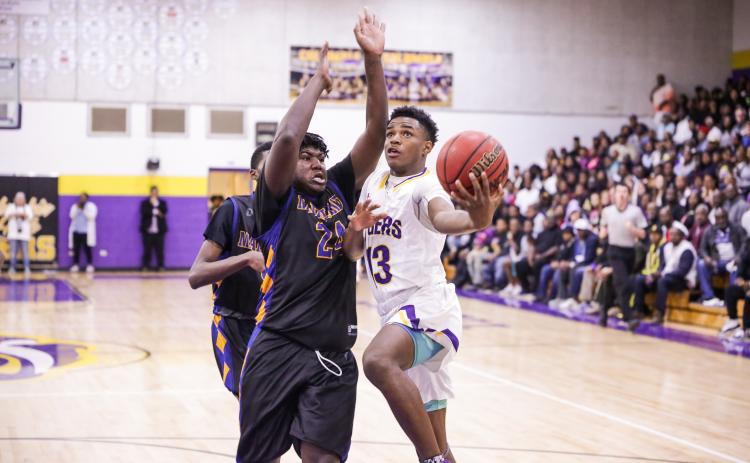 Columbia guard Tray Tolliver goes up for a shot against Dayton Beach Mainland during last season’s Region 1-6A final on Feb. 28. (BRENT KUYKENDALL/Lake City Reporter)