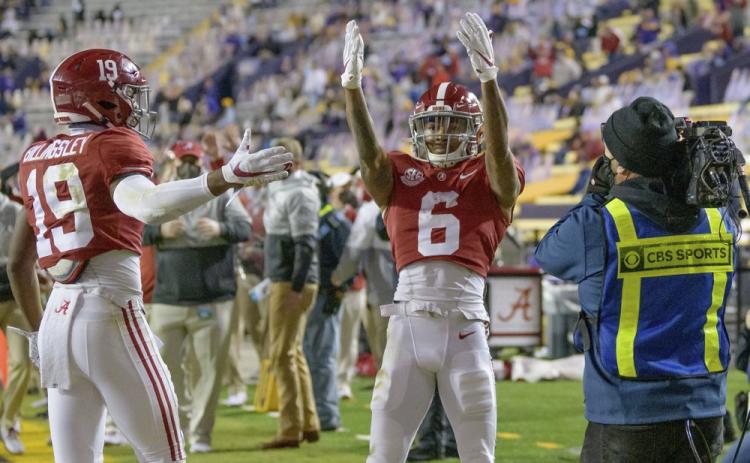 Alabama wide receiver DeVonta Smith (6) blows kisses to the stands after a touchdown against LSU on Dec. 5 in Baton Rouge, La. (MATTHEW HINTON/Associated Press)