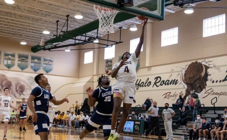 Columbia forward Marcus Peterson scores a layup against Tampa Gaither during the Battle at The Villages on Tuesday. (COURTESY)