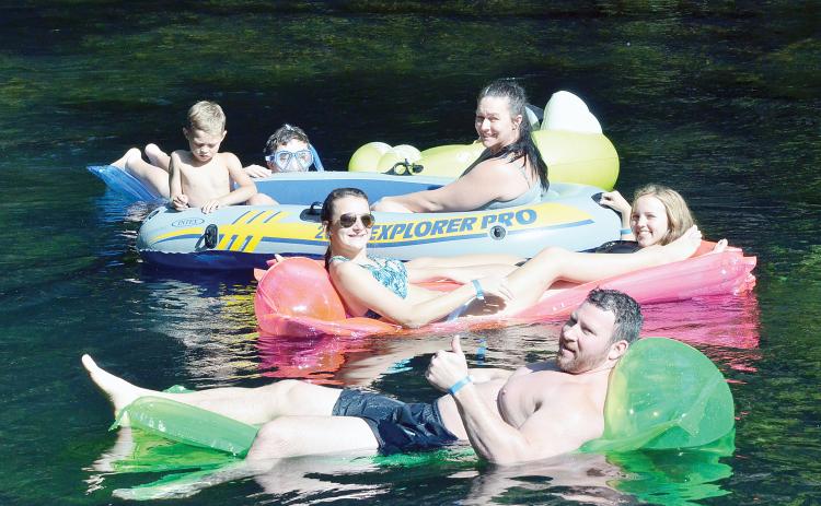 The Scott family floats down the Ichetucknee River in this file photo from the 2016 summer tubing season. Tubing may no longer be allowed on the Upper Ichetucknee according to a plan proposed by the Florida Department of Environmental Protection. (FILE)