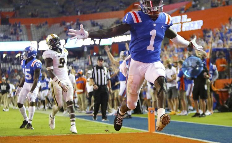 Florida receiver Kadarius Toney (1) celebrates a touchdown against Missouri on Oct. 31 in Gainesville. (BRAD MCCLENNY/AP File Pool Photo)