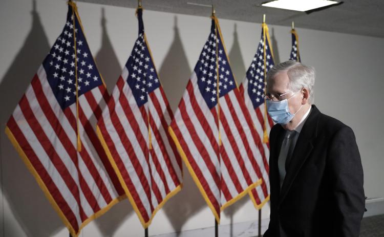 Senate Majority Leader Mitch McConnell (R-Kentucky) departs after the Republican policy luncheon on Nov. 18 on Capitol Hill in Washington, D.C. (YURI GRIPAS/Abaca Press/TNS)