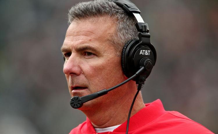 Former Ohio State Buckeyes coach Urban Meyer is reportedly near a deal to become the Jacksonville Jaguars new coach. (MIKE MULHOLLAND/TNS)