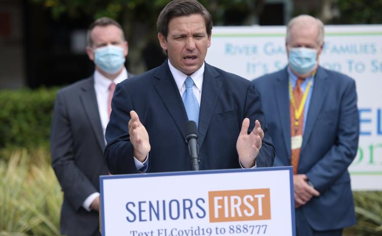 Florida Governor Ron DeSantis addresses the media Monday on the status of covid-19 vaccination rates in the state’s nursing homes and assisted living facilities. (BOB SELF/Florida Times-Union/TNS)