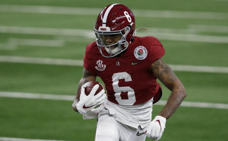 Alabama wide receiver DeVonta Smith (6) gains yardage after a catch in the first half of the Rose Bowl against Notre Dame on Jan. 1 Arlington, Texas. (ROGER STEINMAN/Associated Press)