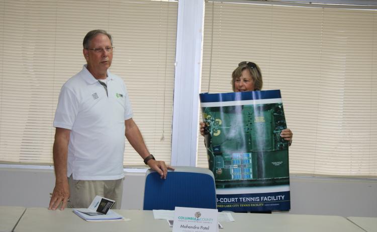 Mike Null and Dolly Robinson from the Lake City Columbia County Tennis Association speak during a presentation Wednesday afternoon at the Columbia County Tourist Development Council meeting. (TONY BRITT/Lake City Reporter)