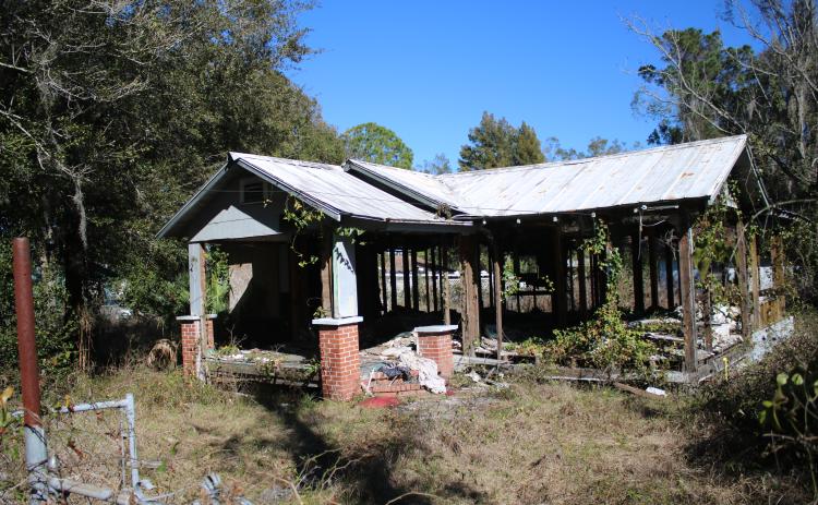 An abandoned house sits on Broadway is listed as owing lien fees at $25 per day since September 2019. The city has several such properties with lien fees topping $4.5 million. The city’s lien amnesty program could reduce the amount of blighted properties in the city. (TONY BRITT/Lake City Reporter)