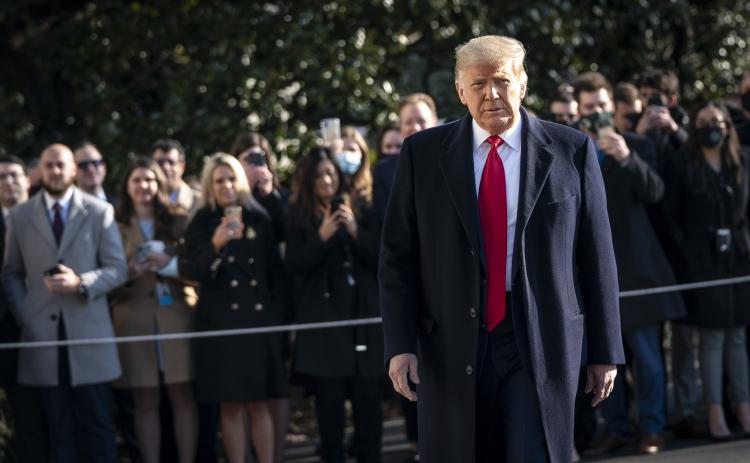 U.S. President Donald Trump turns to reporters as he exits the White House to walk toward Marine One on the South Lawn on Tuesday in Washington, D.C. (DREW ANGERER/Getty Images/TNS)
