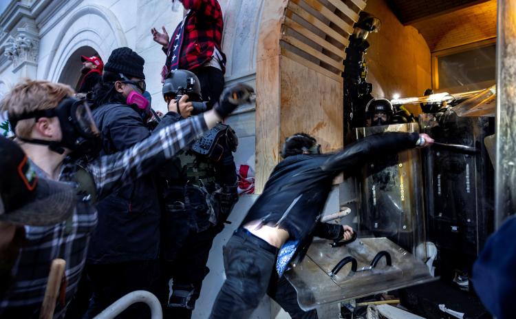 Rioters attack DC police and security forces as they try to storm the U.S. Capitol on Jan. 6 in Washington, DC. (Getty Images/TNS)