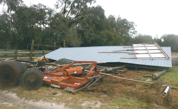 The barn on David Vining’s property was uprooted Monday afternoon by a tornado that blew through west central Columbia County. (MORGAN MCMULLEN/Lake City Reporter)