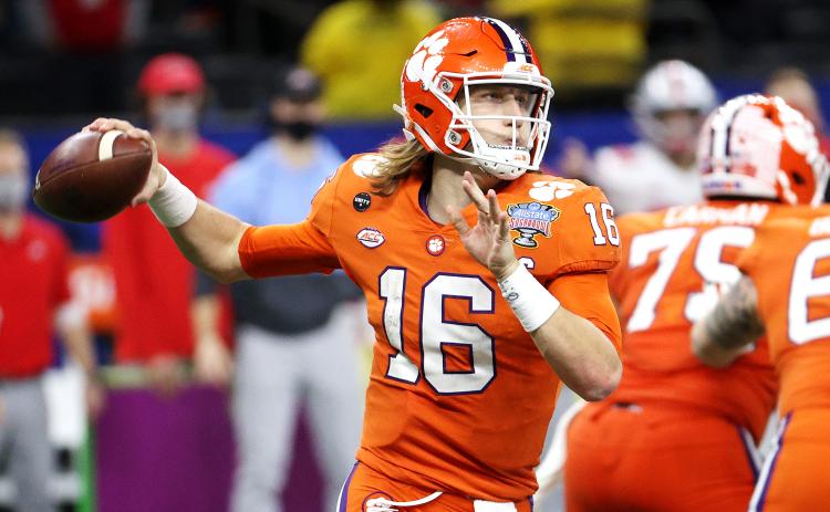 Clemson Tigers quarterback Trevor Lawrence (16) passes against the Ohio State Buckeyes in the second half of the College Football Playoff semifinal at the Allstate Sugar Bowl at Mercedes-Benz Superdome on Jan. 1 in New Orleans, Louisiana. (CHRIS GRAYTHEN/Getty Images/TNS)