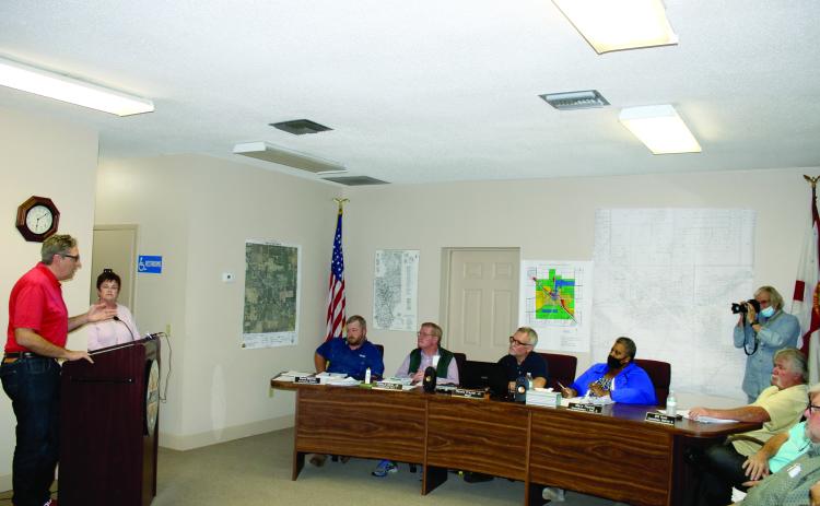 Lake City Councilman Todd Sampson talks to the Fort White Town Council about the city providing utility services to Fort White at a meeting Monday. (TONY BRITT/Lake City Reporter)