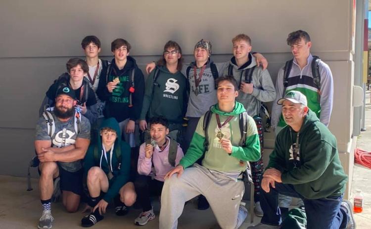 Suwannee's wrestling team at Saturday's District 2-1A IBT. (COURTESY)