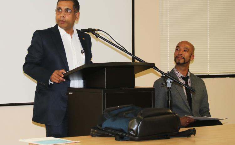 Madhukar Sharma, ACE Medical CEO and Joseph Ellyson, ACE Medical COO, prepare for a presentation to the Lake Shore Hospital Authority Board Wednesday evening about services the corporation could bring to the county. (TONY BRITT/Lake City Reporter)