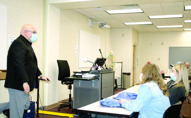 Lake City Medical Center CEO Rick Naegler talks to Florida Gateway College nursing students Wednesday during a nursing recruitment fair at the Barney E. McRae Jr. Medical Technology Building. (TONY BRITT/Lake City Reporter)