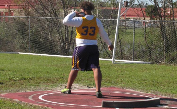 Columbia’s Nate Walmsley gets set to throw during the shot put at Tuesday’s Santa Fe mini meet. (COURTESY)