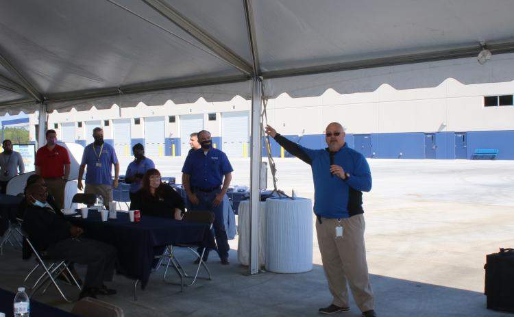Jason Easom, Werner terminal manager in Lake City, introduces Derek Leathers, Werner president and CEO, during the company’s Spring Driver Appreciation Week activities Monday morning. (TONY BRITT/Lake City Reporter)