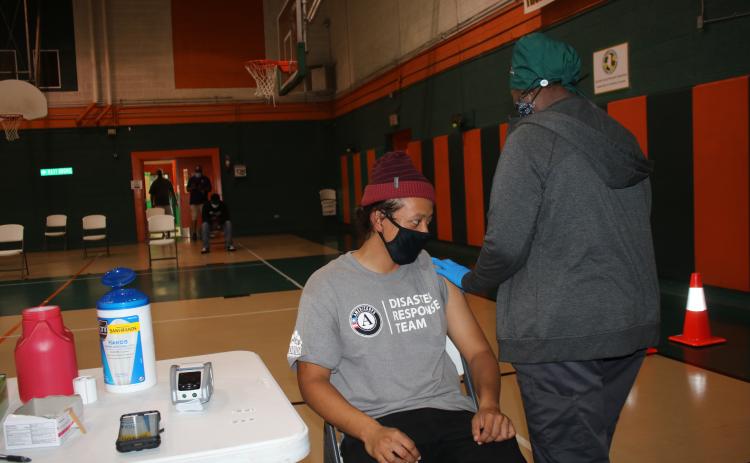 Alejandro Lara prepares to get a Johnson & Johnson covid-19 vaccination Wednesday afternoon while at the Richardson Community Center. (TONY BRITT/Lake City Reporter)