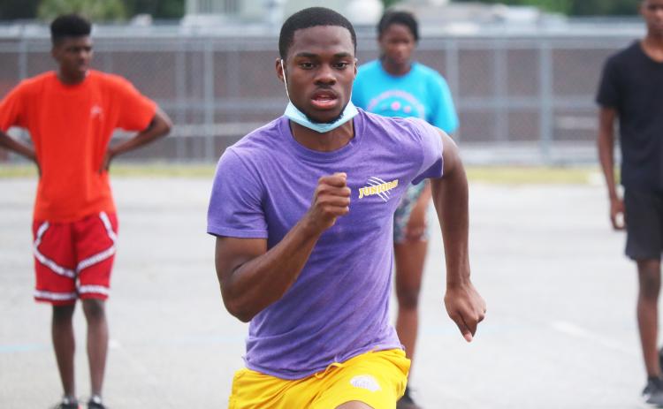Columbia’s James Williamson runs during Thursday’s practice. Williamson broke the school records in the 100m and 200m at Santa Fe's Last Chance Meet on Wednesday. (JORDAN KROEGER/Lake City Reporter)