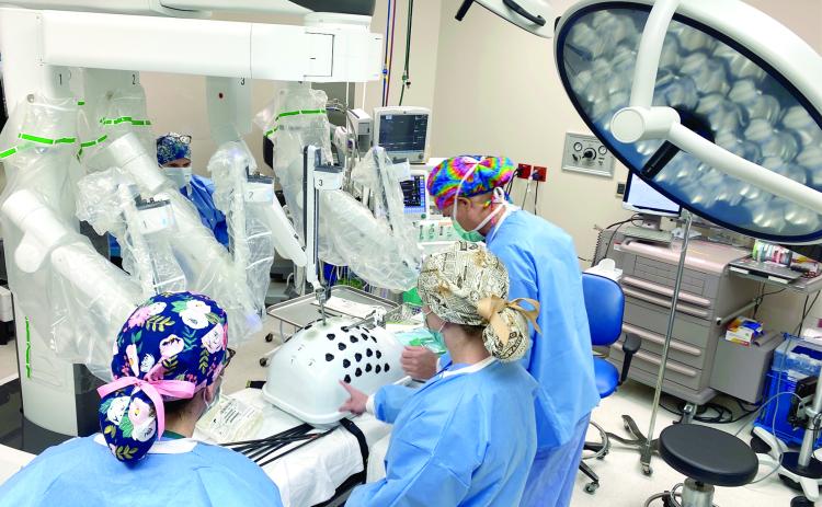 Lake City Medical Center staff test out the hospital’s new $1.6 million surgical robot, the da Vinci Xi Surgical Robot. (COURTESY)