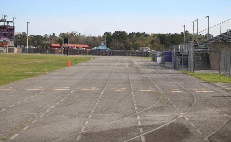 Columbia High School track coach Lawrence Davis met with local officials to discuss funding to improve the track at Tiger Stadium. The asphalt hasn’t been upgraded since Davis took the job in 1995. (FILE)
