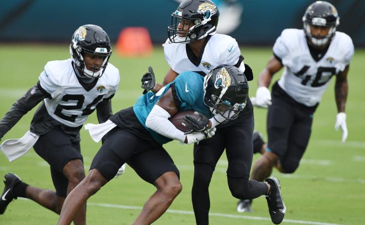 Jacksonville Jaguars receiver Terry Goodwin tries to get past cornerbacks Josiah Scott (24) and Luq Barcoo (3) during drills at in a practice session at TIAA Bank Field on Aug, 29, 2020, in Jacksonville. (BOB SELF/Florida Times-Union)