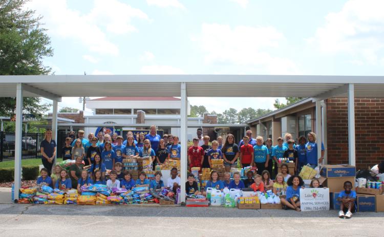Eastside students with supplies for the LCHS. (TONY BRITT/Lake City Reporter)