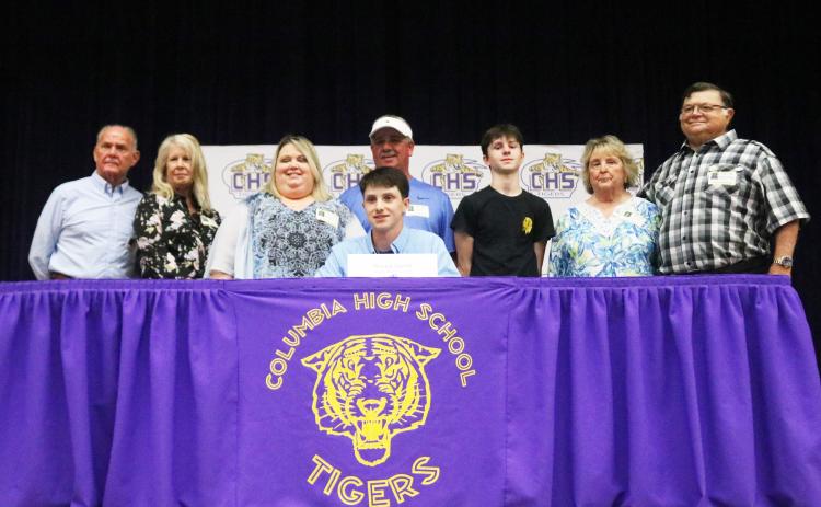 Columbia outfielder/catcher Bryant Green is pictured with his family after signing his letter of intent with Trinity Baptist College on Thursday afternoon. (JORDAN KROEGER/Lake City Reporter)