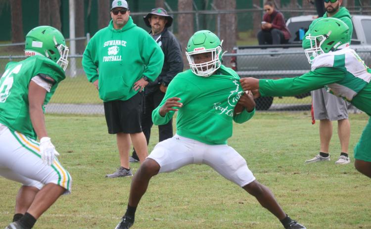 Suwannee running back Malachi Graham gets tackled during Thursday’s practice. (JAMIE WACHTER/Lake City Reporter)
