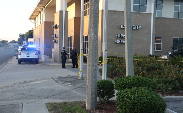 The victim was driven to the Lake City Public Safety Building before being taken to an area hospital. (MORGAN MCMULLEN/Lake City Reporter)