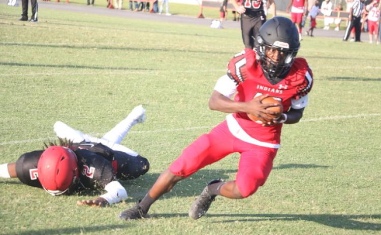 Fort White receiver Najeeb Smith breaks away for what he thought was a 50-yard touchdown during Thursday’s spring game against Lafayette. The score was called back for holding. (MORGAN MCMULLEN/Lake City Reporter)