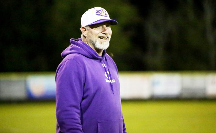 Columbia coach Brian Thomas cracks a smile during his team’s game against Bradford on March 3. (BRENT KUYKENDALL/Lake City Reporter)