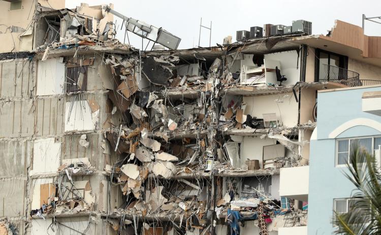 The 12-story oceanfront Champlain Towers South Condo in Surfside is shown on Friday. A large portion of the building collapsed very early Thursday morning. (AMY BETH BENNETT/South Florida Sun-Sentinel/TNS)