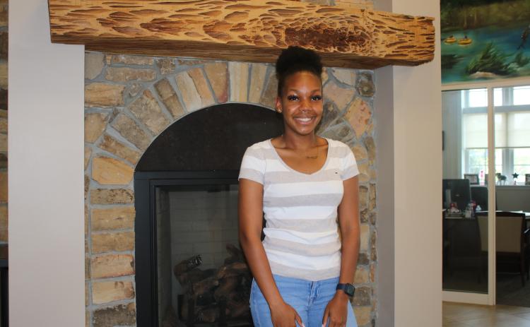Columbia High School graduate Aagust Anderson has attended every day of school for the past 13 years. (TONY BRITT/Lake City Reporter)