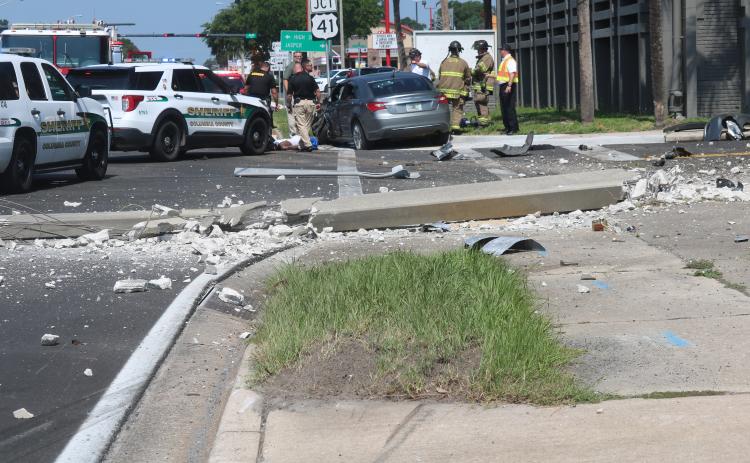 A Chrysler sedan led law enforcement officers on a chase topping 100 mph just before 11 a.m. Tuesday morning. The driver, 32-year-old Tyrece Roundtree, smashed into the side of a medical services van before crashing to a stop at the intersection of U.S. Highway 90 and N. Marion Ave. (JAMIE WACHTER/Lake City Reporter)