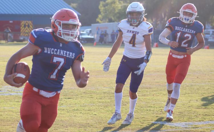 Branford running back Bodhi White bolts down the field for a touchdown against Bell in the teams’ spring game on May 24. (JAMIE WACHTER/Lake City Reporter)