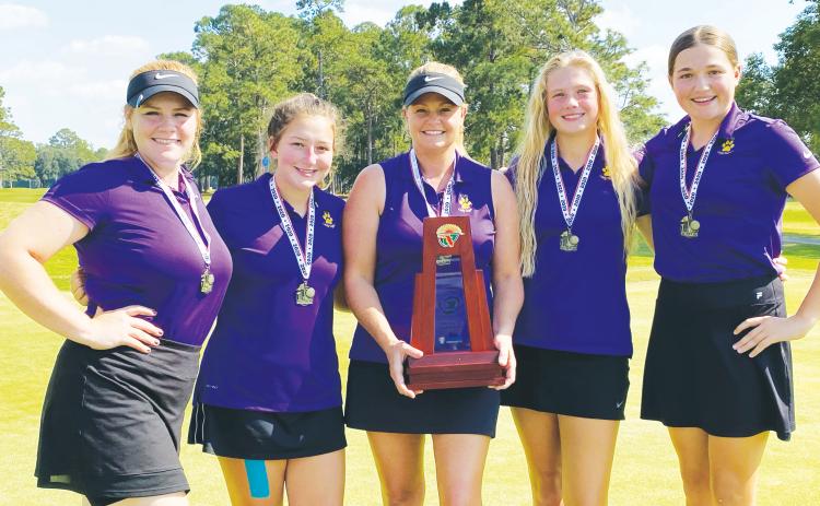 Columbia’s girls golf team won the District 2-2A title this past season, the first since 2014. at Quail Heights. Coach Tammy Winnett (middle) resigned as the team's coach on Tuesday. (FILE)