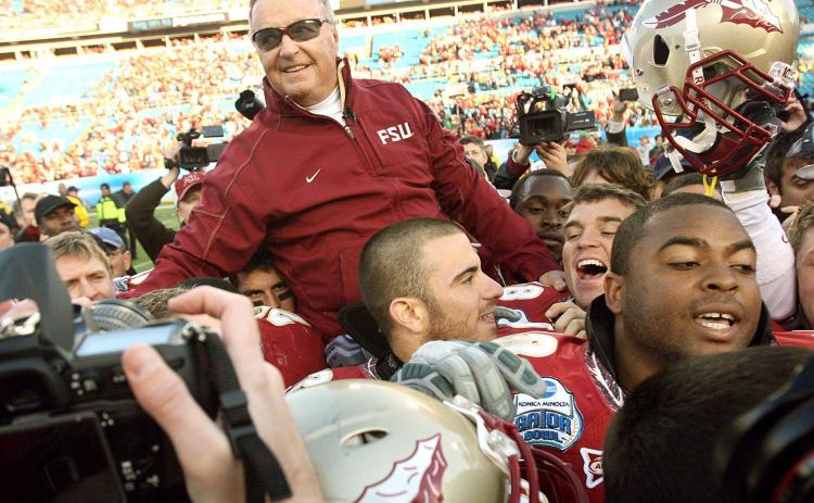 Former Florida State coach Bobby Bowden is carried triumphantly on the shoulders of his players after beating West Virginia, 33-21, in the Gator Bowl at Jacksonville Municipal Stadium on Jan. 1, 2010, in Jacksonville. (STEPHEN M. DOWELL/TNS)