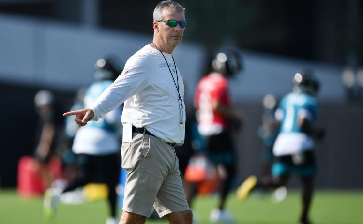 Jacksonville Jaguars head coach Urban Meyer directs players during the first day of training camp on Wednesday at the team's practice fields outside TIAA Bank Field in Jacksonville. (BOB SELF/The Florida Times-Union/TNS)