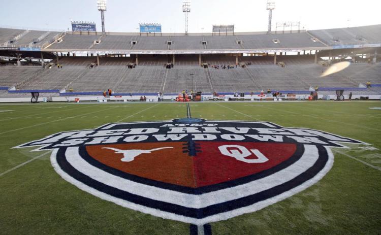 The Red River Showdown logo is displayed on the field of the Cotton Bowl, prior to a game between Texas and Oklahoma on Oct. 10, 2020, in Dallas. (AP FILE)