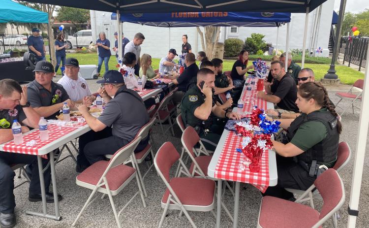 First Responders from the Lake City Fire Department, Columbia County Sheriff’s Office and Lake City Police Department enjoy a free appreciation luncheon Friday from GulfCoast Financial and the Lake City Reporter. (TODD WILSON/Lake City Reporter)