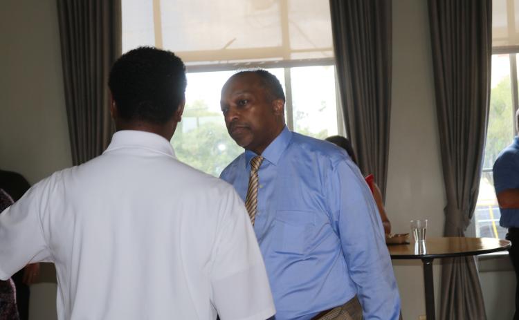 Jeffrey Hunt, a candidate for the Lake City-Columbia County Chamber of Commerce executive director, listens during a meet-and-greet Thursday. (JAMIE WACHTER/Lake City Reporter)