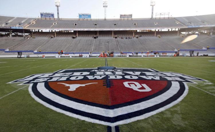 The Red River Showdown logo is displayed on the field of the Cotton Bowl, prior to a game between Texas and Oklahoma on Oct. 10, 2020, in Dallas. (AP FILE)