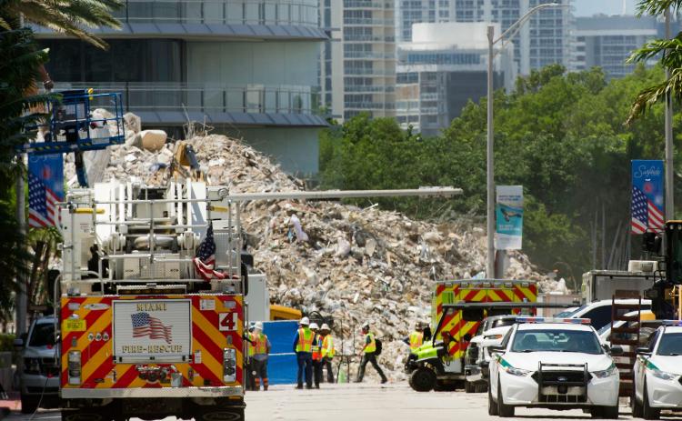 Workers search the site of the collapsed Champlain Towers South building in Surfside on July 11. The search was called off Friday after a month of painstaking work. (MEGHAN McCARTHY/Palm Beach Post/TNS)
