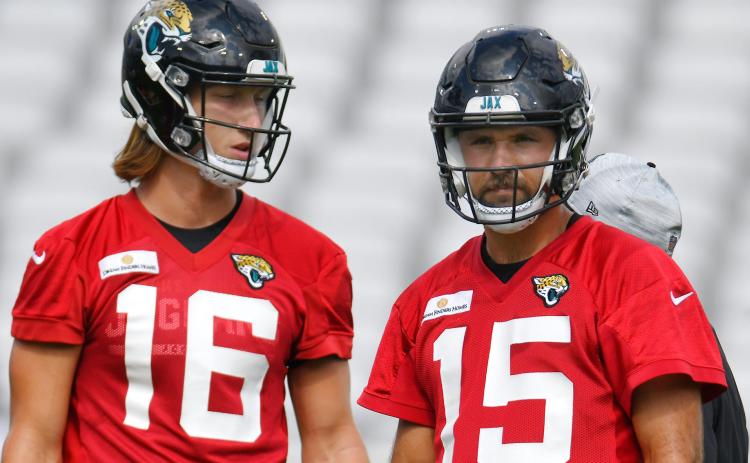 Jacksonville Jaguars quarterbacks Trevor Lawrence (16) and Gardner Minshew II (15) are pictured during Sunday's scrimmage session at TIAA Bank Field in Jacksonville. (BOB SELF/Florida Times-Union/TNS)
