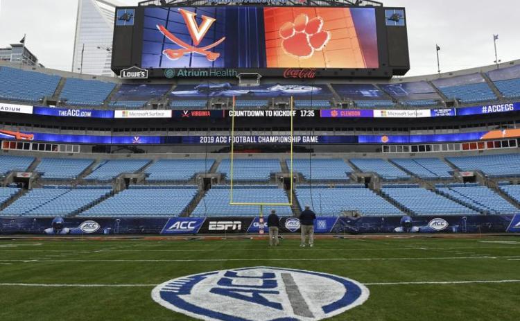The ACC Championship logo is displayed on the field before kickoff at Bank of America Stadium on Dec. 6, 2019, in Charlotte, N.C. The Atlantic Coast Conference announced an updated covid-19 rescheduling policy on Thursday that means teams unable to play scheduled games because of pandemic-related protocols on its roster will be forced to forfeit. The policy will affect teams in football, field hockey, men’s and women’s soccer and volleyball. (AP FILE)