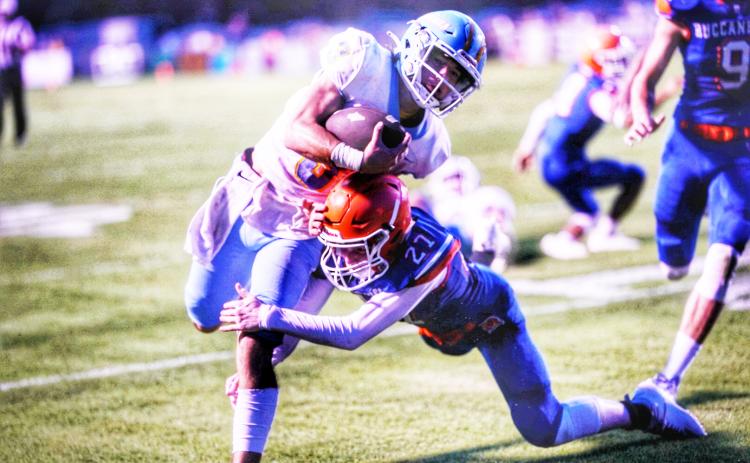 Branford defensive back Brice Criggall (27) lays out for a tackle against Chiefland during the teams’ Preseason Classic on Aug. 20. (BRIAN LEWIS/Special to the Reporter)